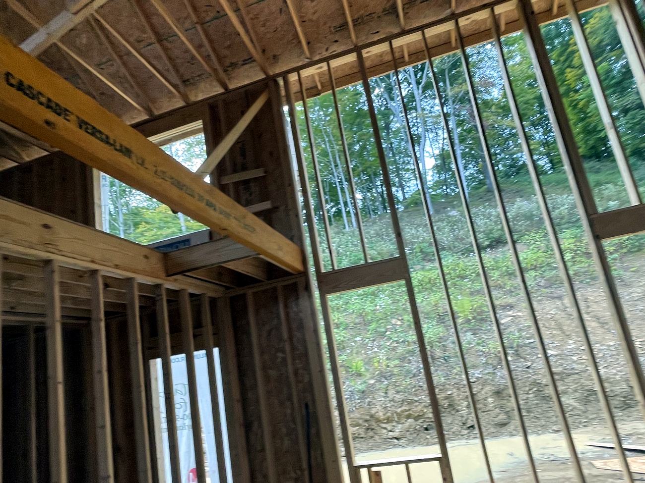 Interior framing and window openings on a Bellmont Contractors ground-up build