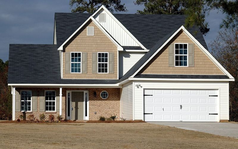 Two-story home with clean siding